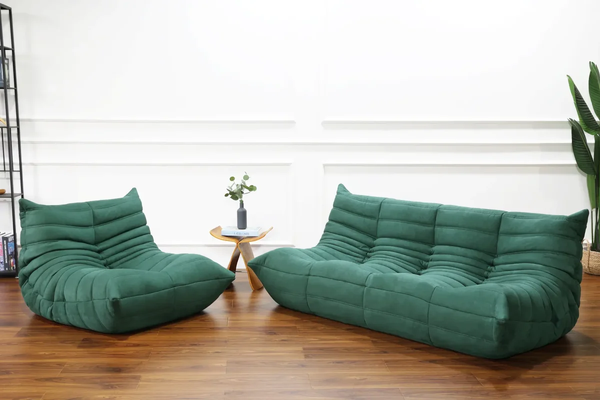 a green togo couches in a room